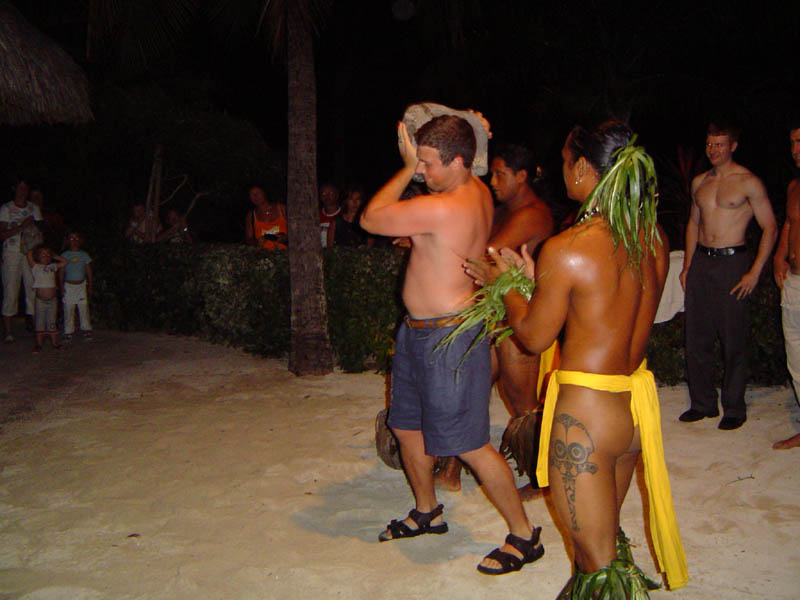 Jeff picking up a lava rock, Tiki show at le Maitai, Bora Bora