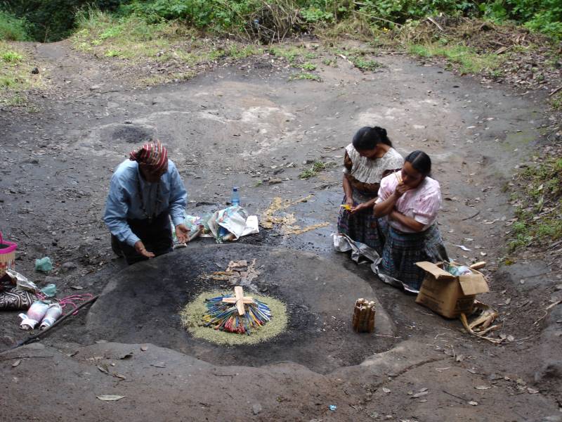 Mayan Ceremony at Cave Entrance near Quiche