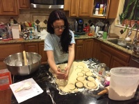 Alex Cutting the Fastnachts