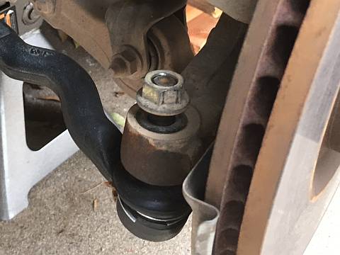 Tie Rod End Nut Positioned to Protect Threads