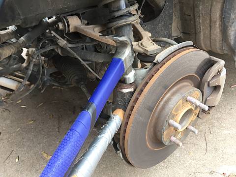 Two-Hammer Setup for Disconnecting Tie Rod Ends